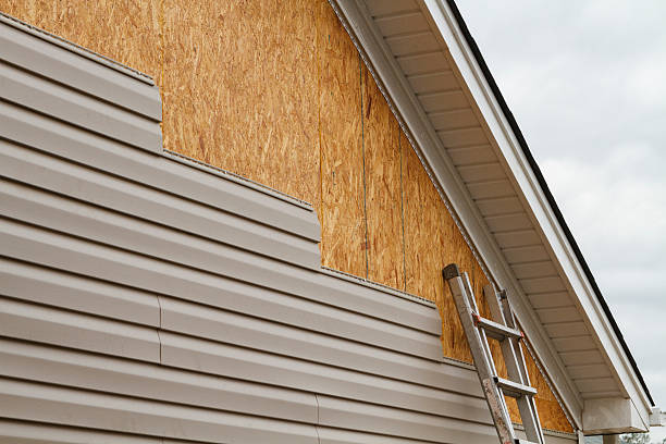 Professional Siding Repair technician working in Durham, NC